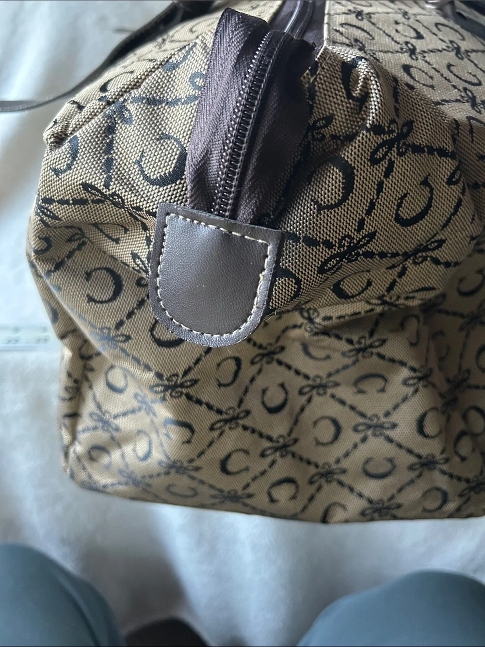 CIAO! 22” duffle bag with faux leather handles buckle